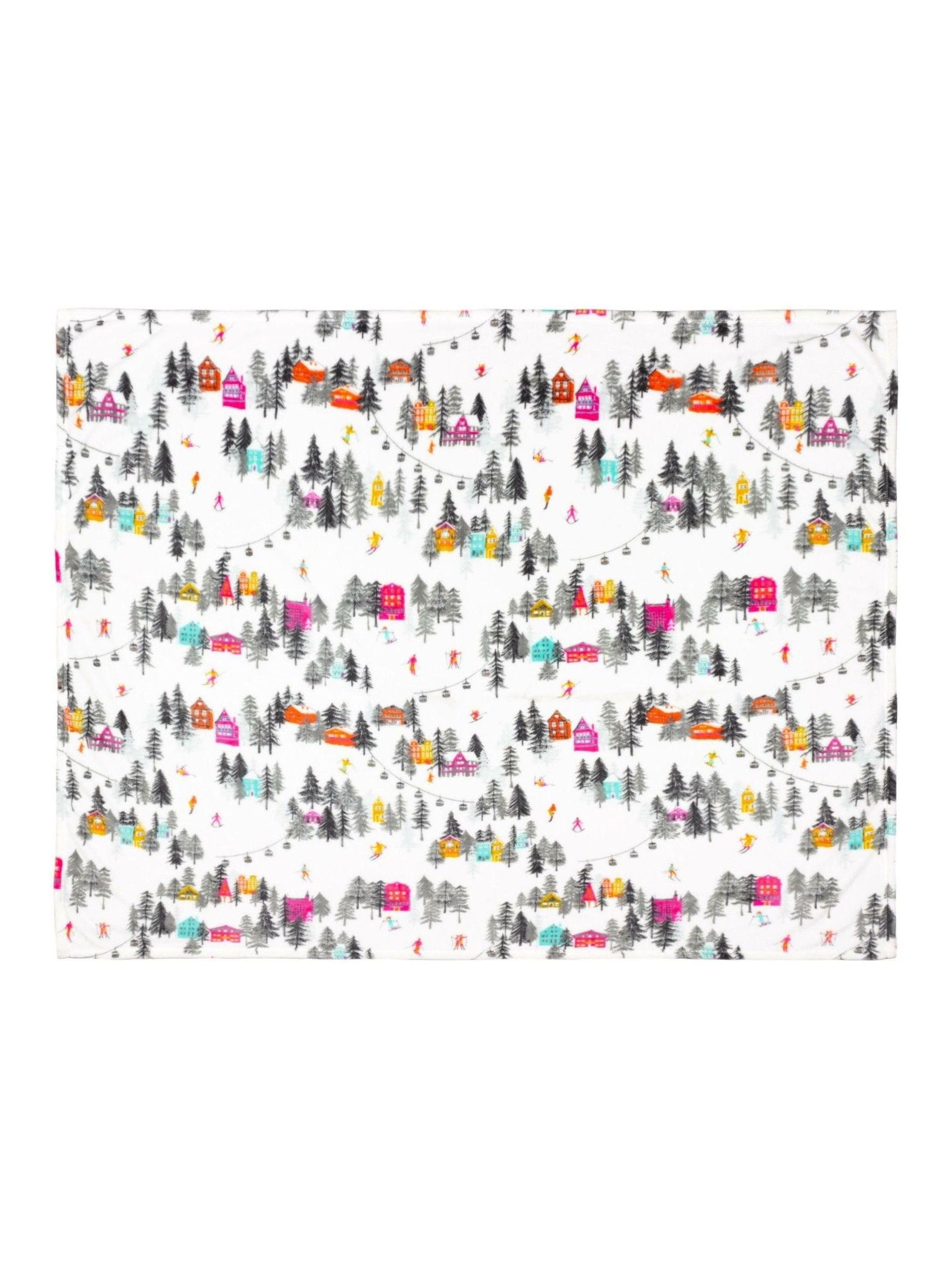 Furn Snow Aspen fleece throw featuring a snowy ski scene (British brand)