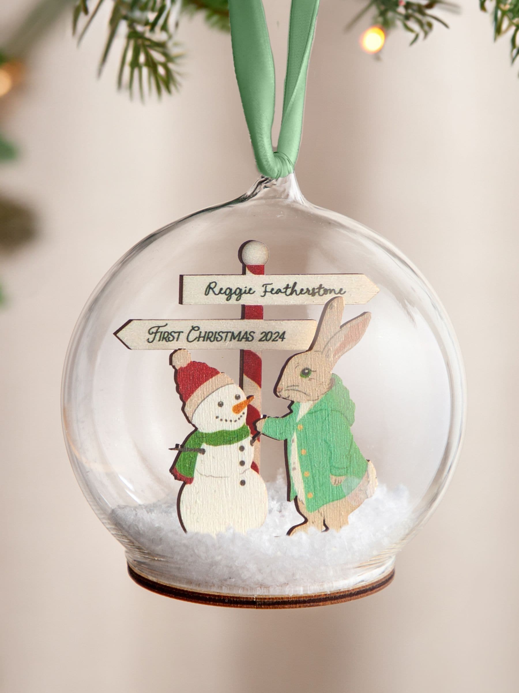 No Ordinary Gift personalised Christmas bauble with rabbit and snowman (British brand)