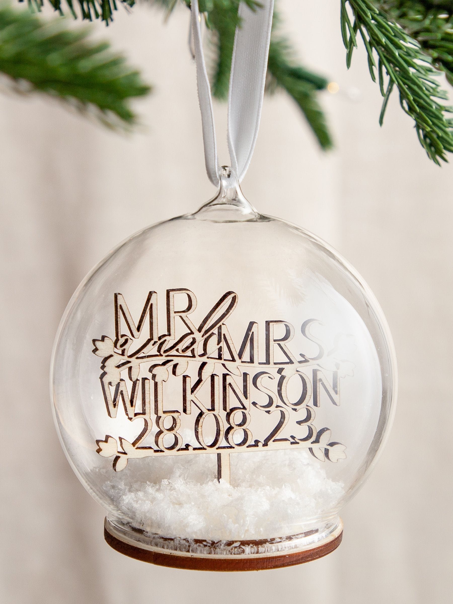 No Ordinary Gift personalised wooden Christmas bauble with names, UK version
