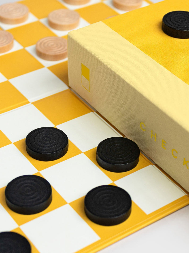 Suck UK checkers board game disguised as a book, imported from the UK