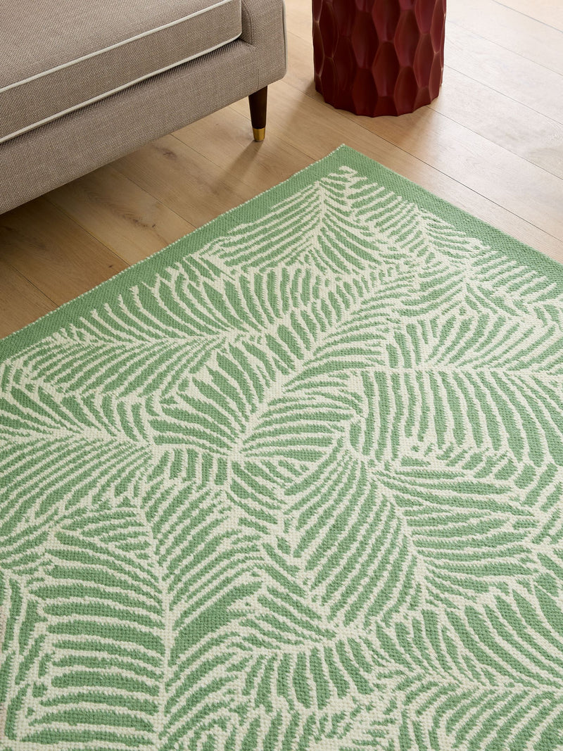 Nina Campbell green tree fern flatweave wool rug (British brand)
