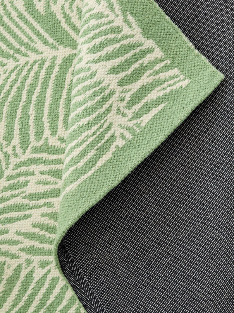 Nina Campbell green tree fern flatweave wool rug (British brand)