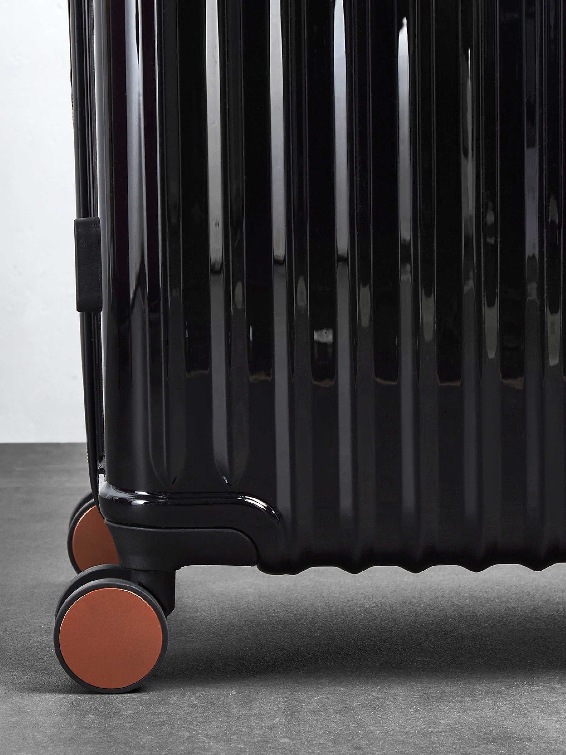 Rock Selene large black suitcase with expandable capacity - British product