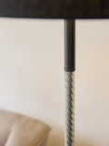 Sosandar black floor lamp with amber glass base, imported from the UK