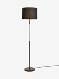Sosandar black floor lamp with amber glass base, imported from the UK