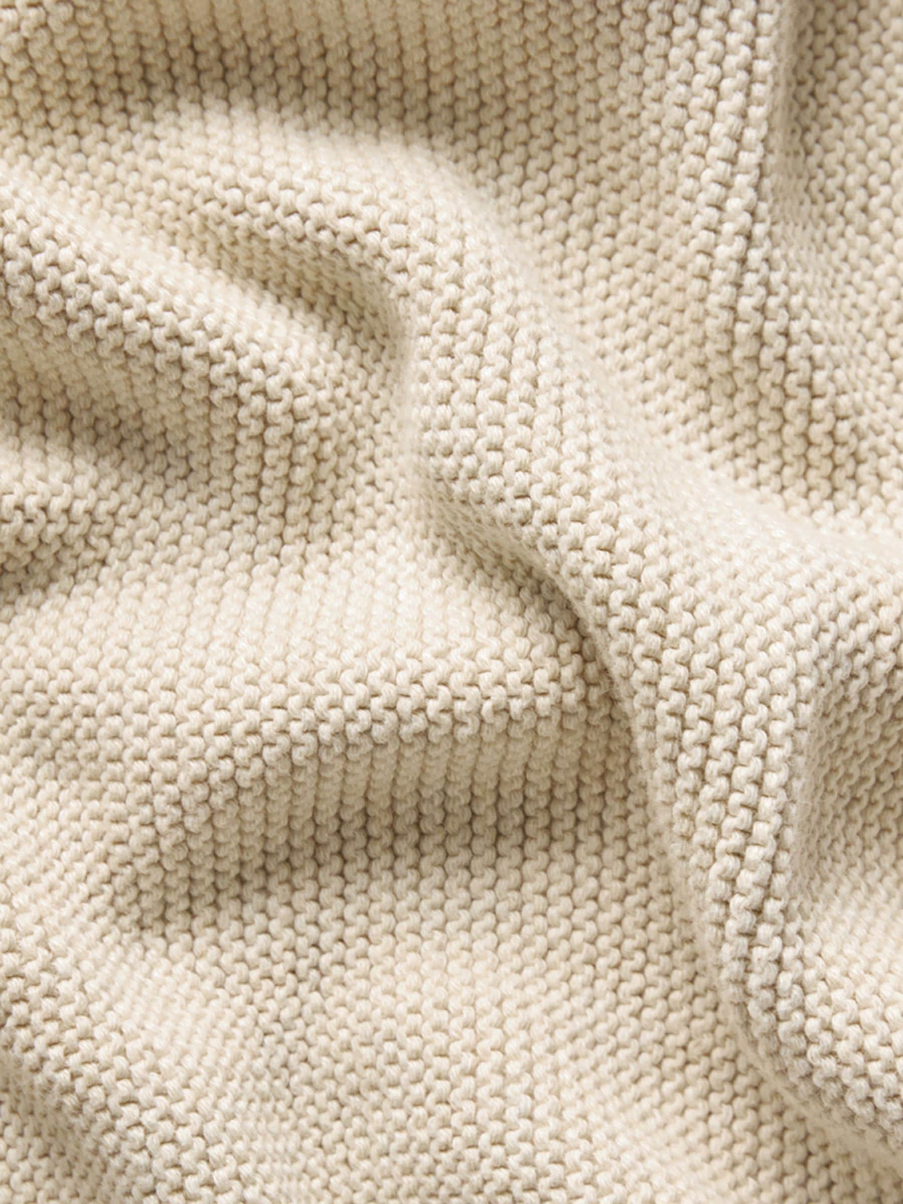 The Little Green Sheep cream knitted cellular baby blanket (British brand)