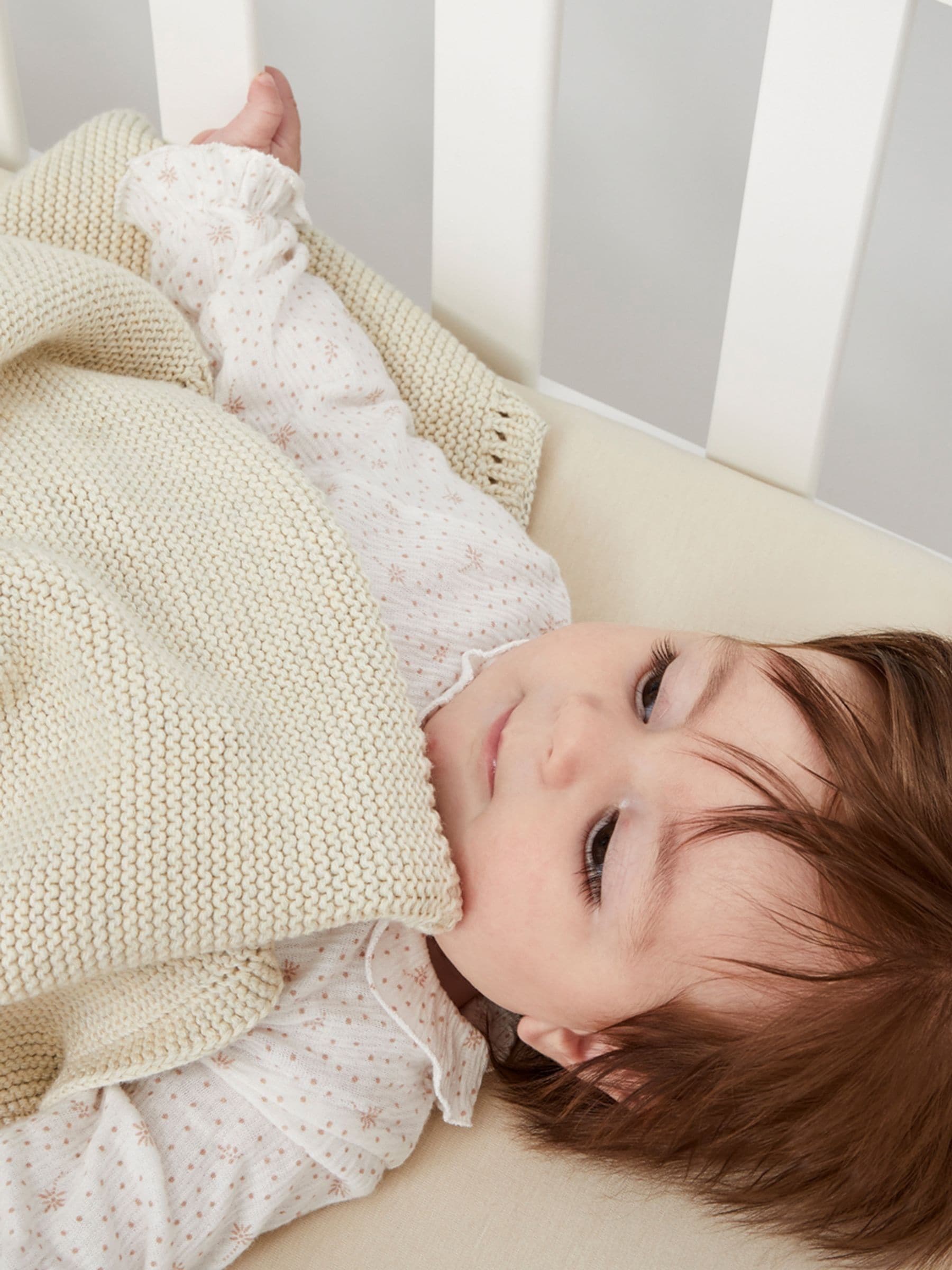 The Little Green Sheep cream knitted cellular baby blanket (British brand)