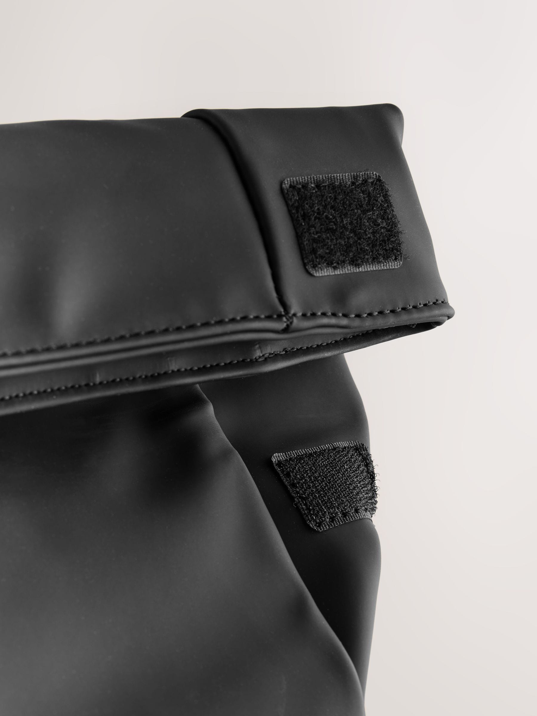 Black roll top backpack polyurethane construction - British product