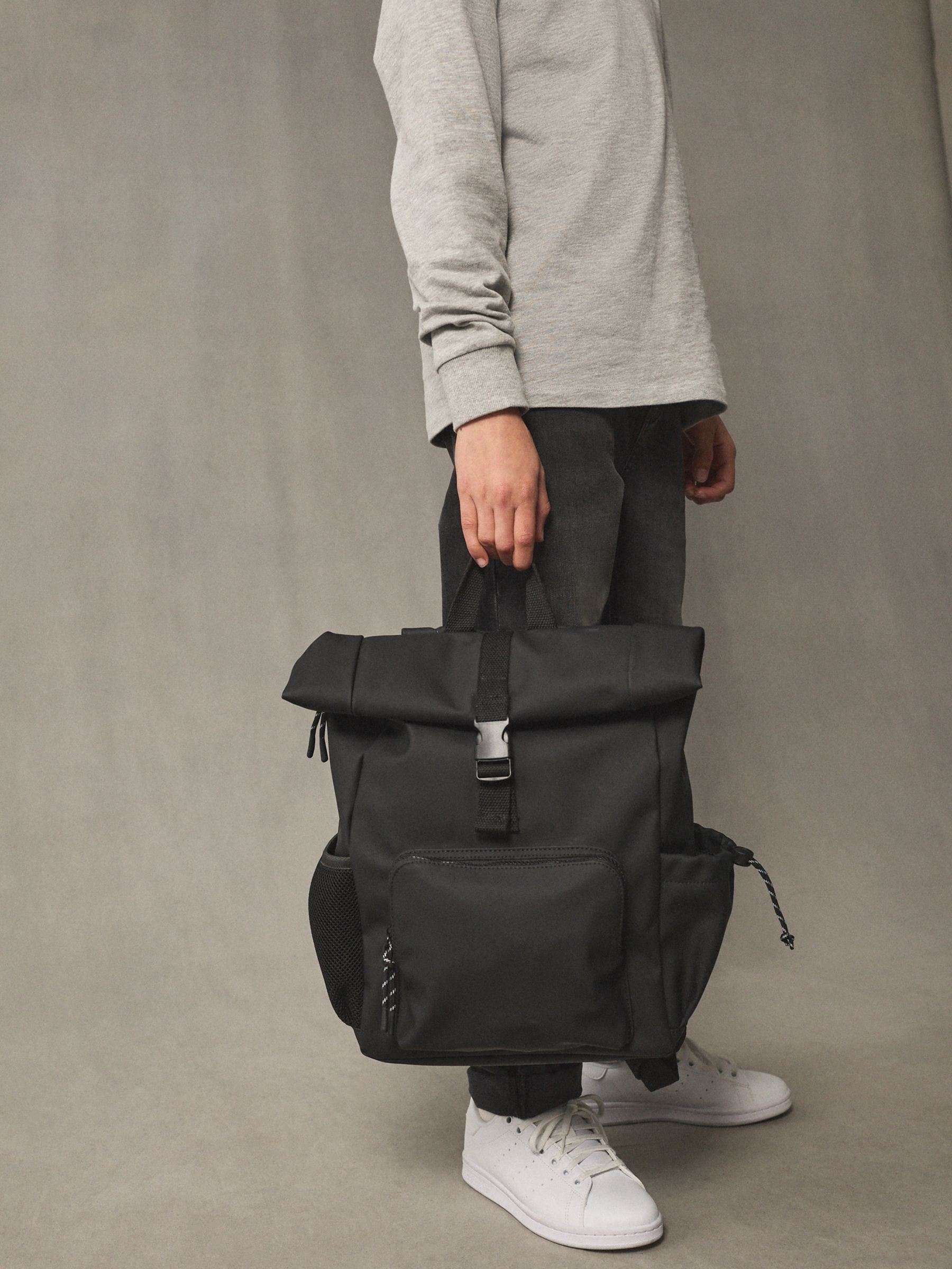 Black roll top backpack polyurethane construction - British product
