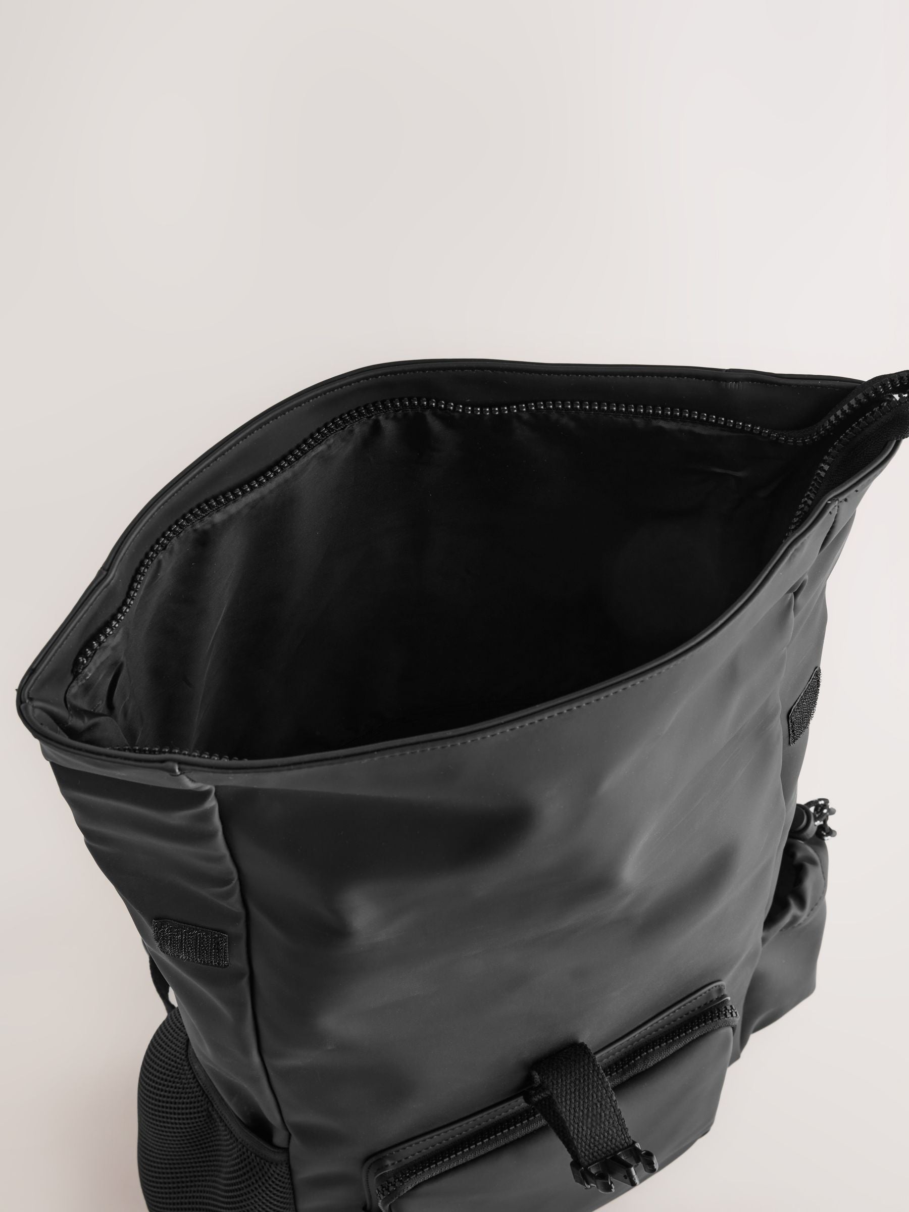 Black roll top backpack polyurethane construction - British product