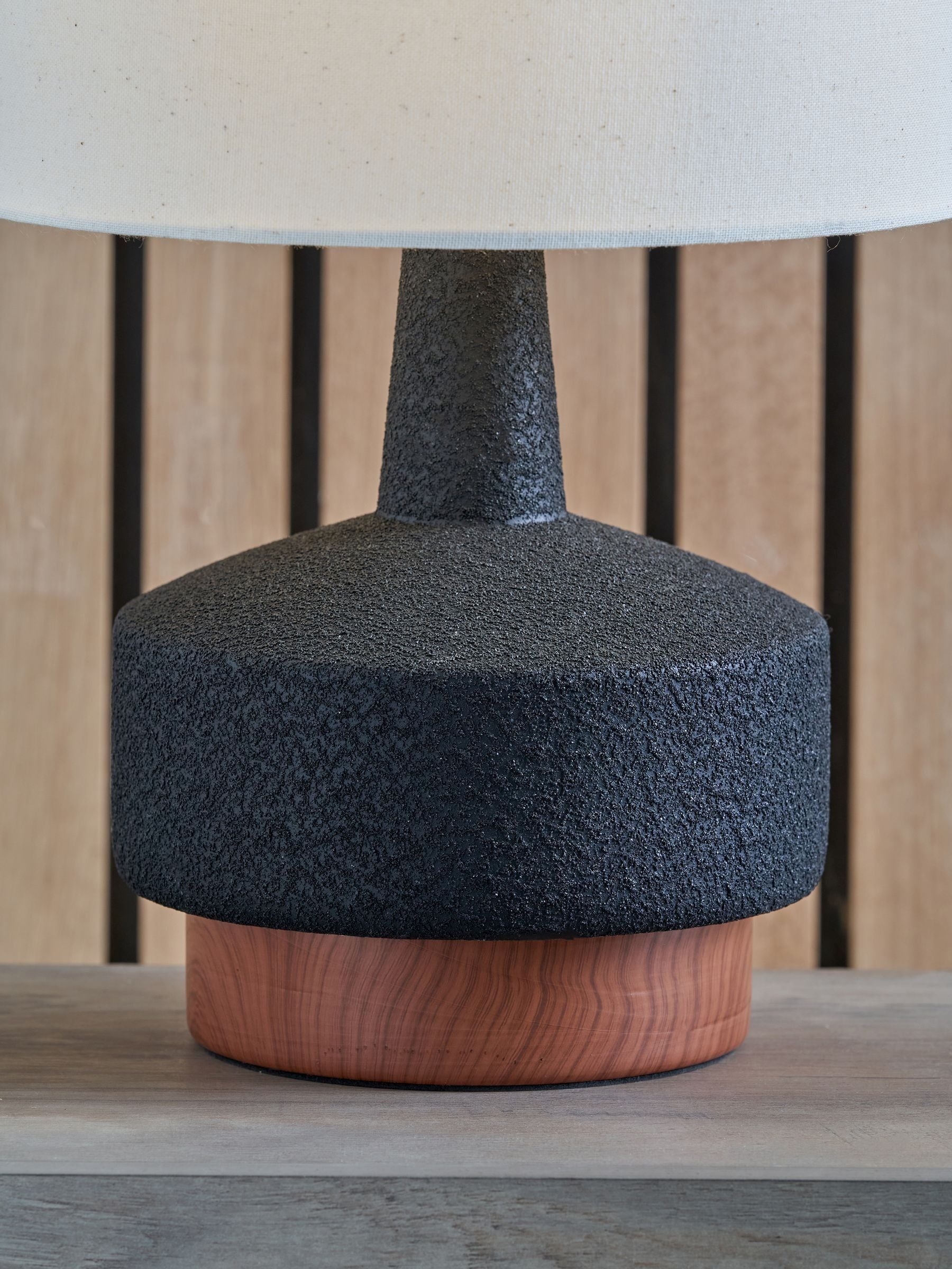 Pacific black wood effect ceramic table lamp with white shade, UK version