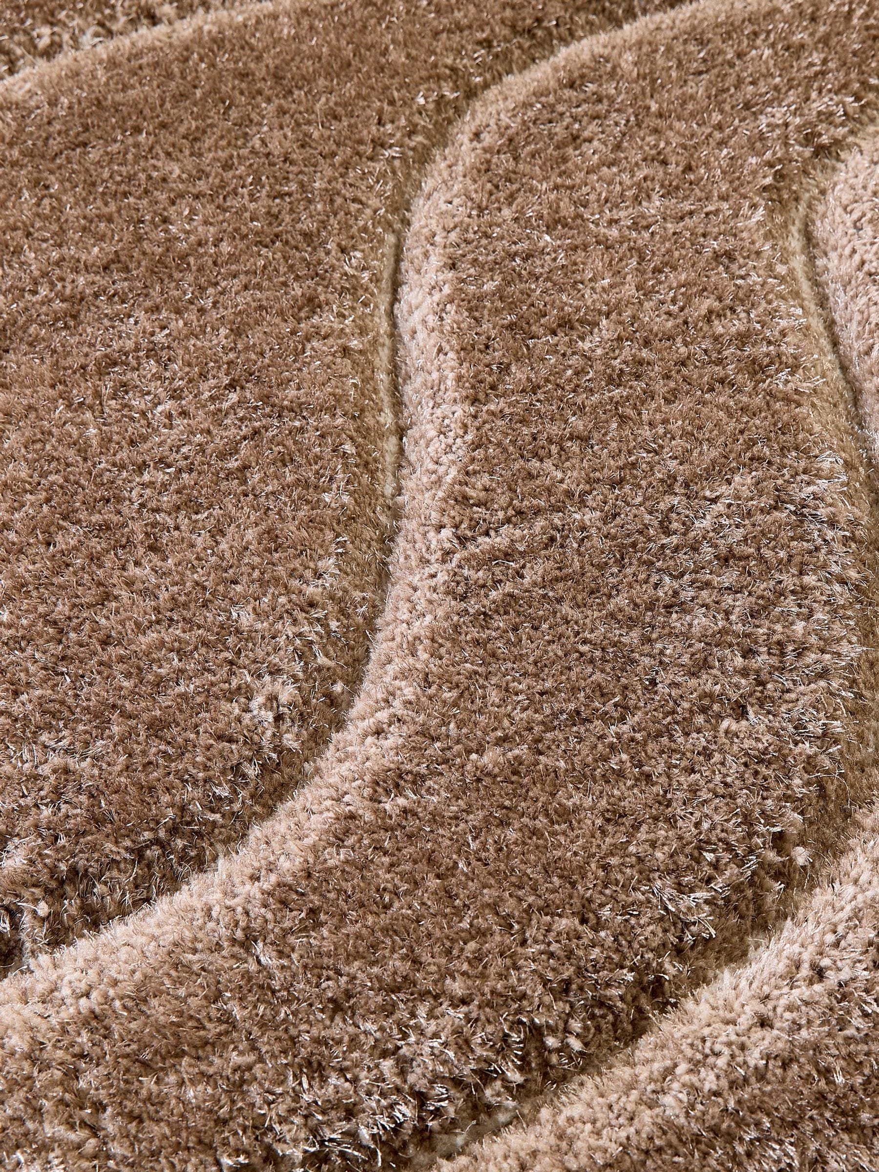 Origin Rugs shaggy rug soft carved wave, imported from the UK