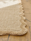 Washable runner rug in light natural with scallop edge, UK version