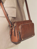 Black double zip cross body bag with adjustable strap, imported from the UK
