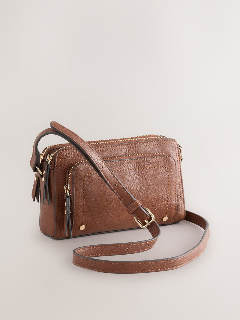 Black double zip cross body bag with adjustable strap, imported from the UK