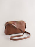 Black double zip cross body bag with adjustable strap, imported from the UK