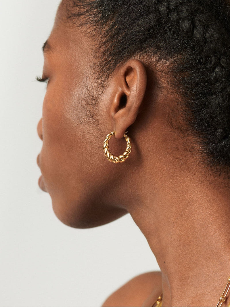 Missoma gold tone twisted tidal small hoop earrings, imported from the UK