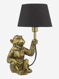 Dar Lighting Gold Zira table lamp, monkey figure, black shade, UK version