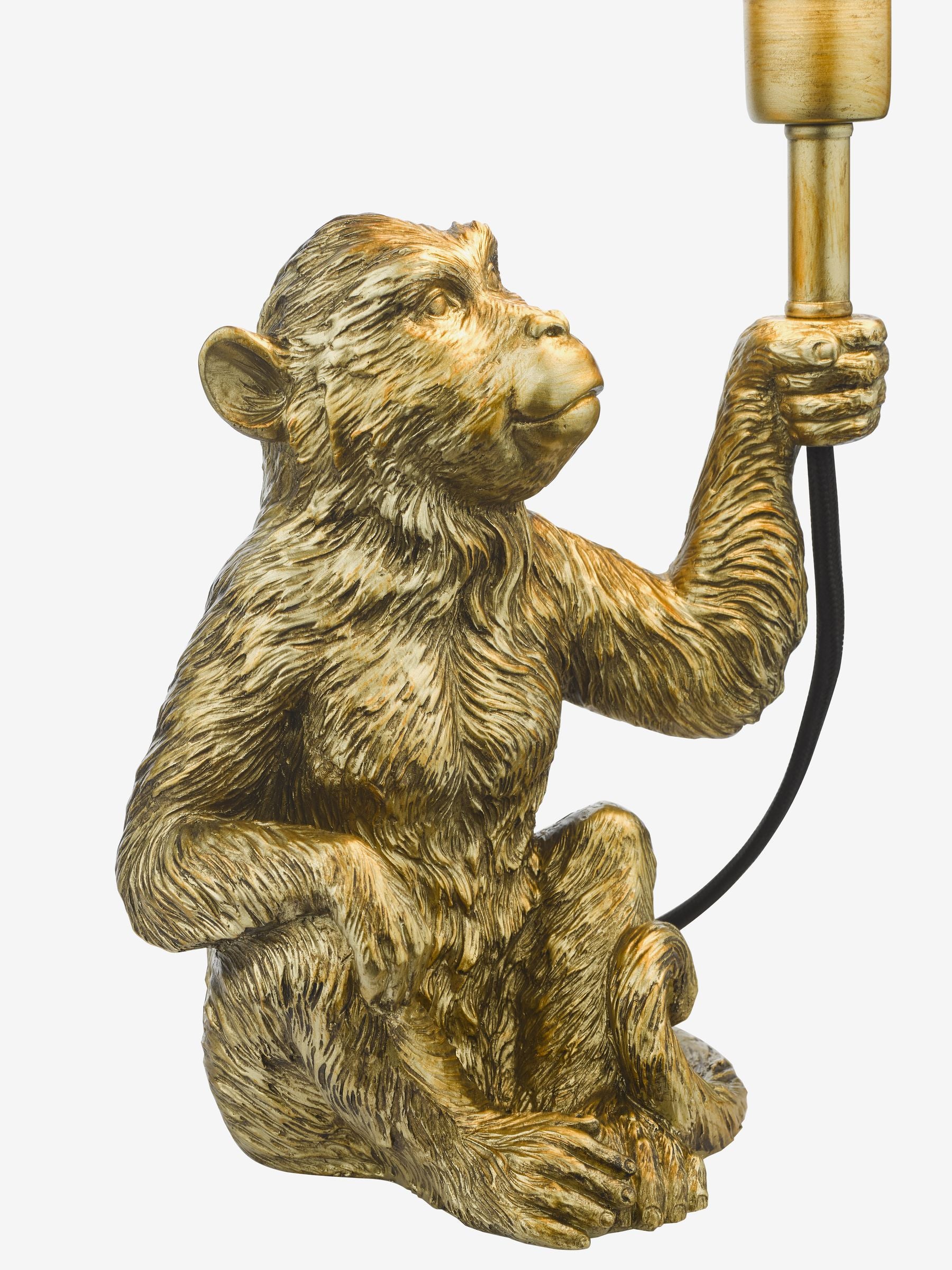 Dar Lighting Gold Zira table lamp, monkey figure, black shade, UK version