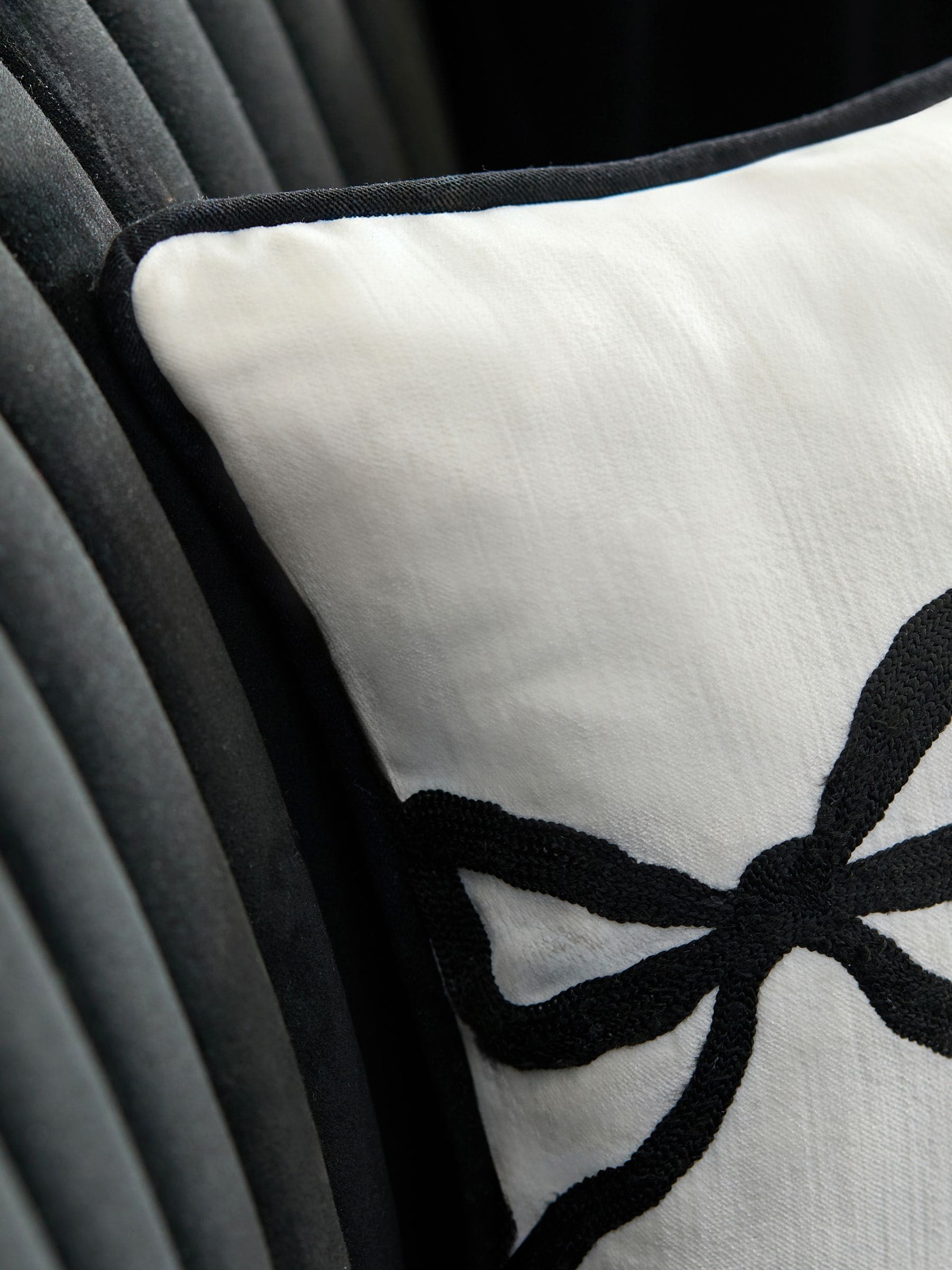 Embroidered bow cushion black white 50x30cm, imported from the UK