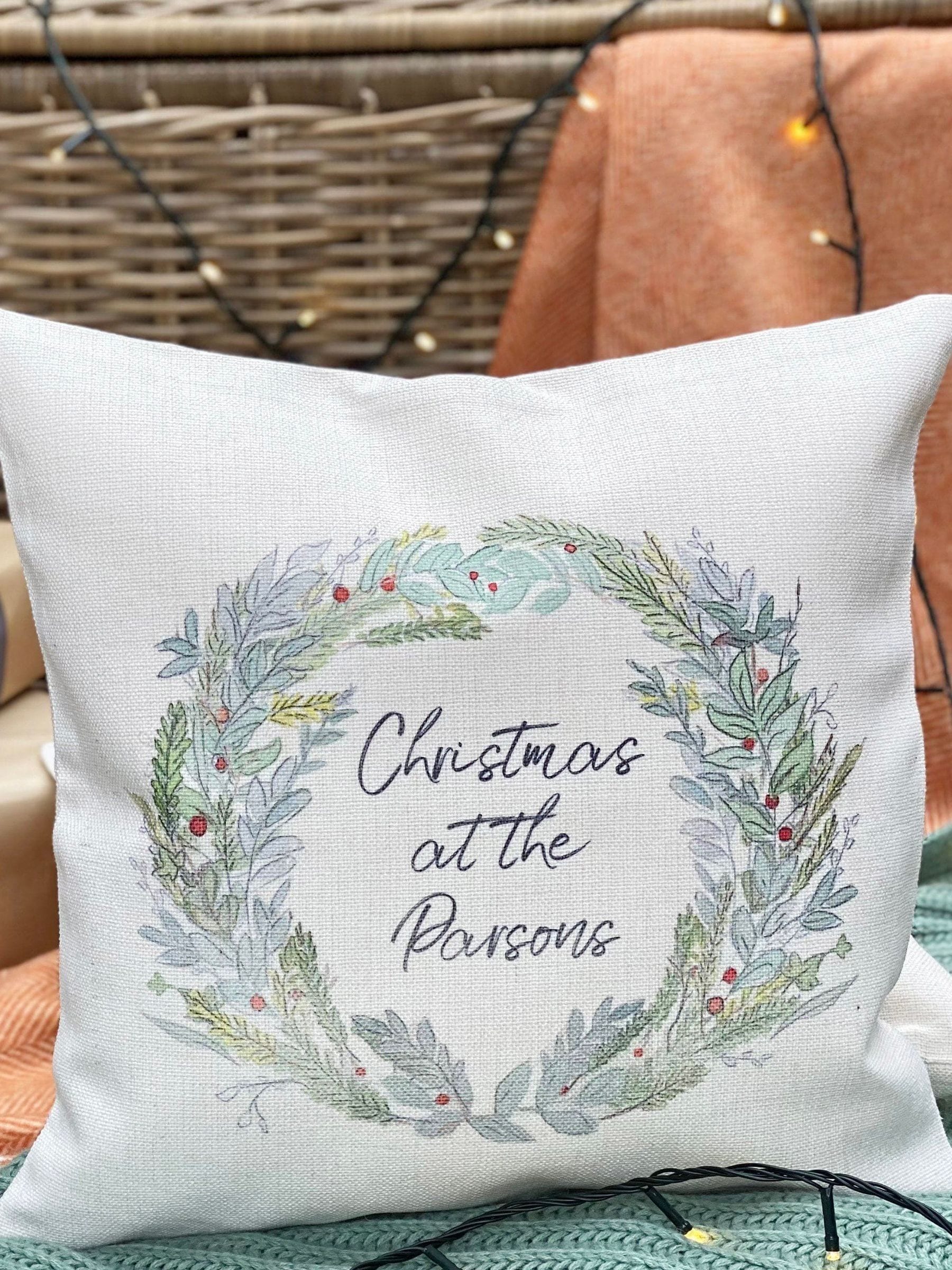 Solesmith linen wreath cushion personalised with family name (British brand)