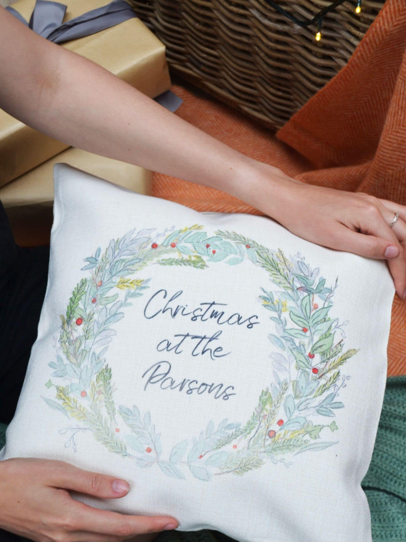 Solesmith linen wreath cushion personalised with family name (British brand)