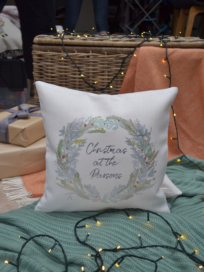 Solesmith linen wreath cushion personalised with family name (British brand)