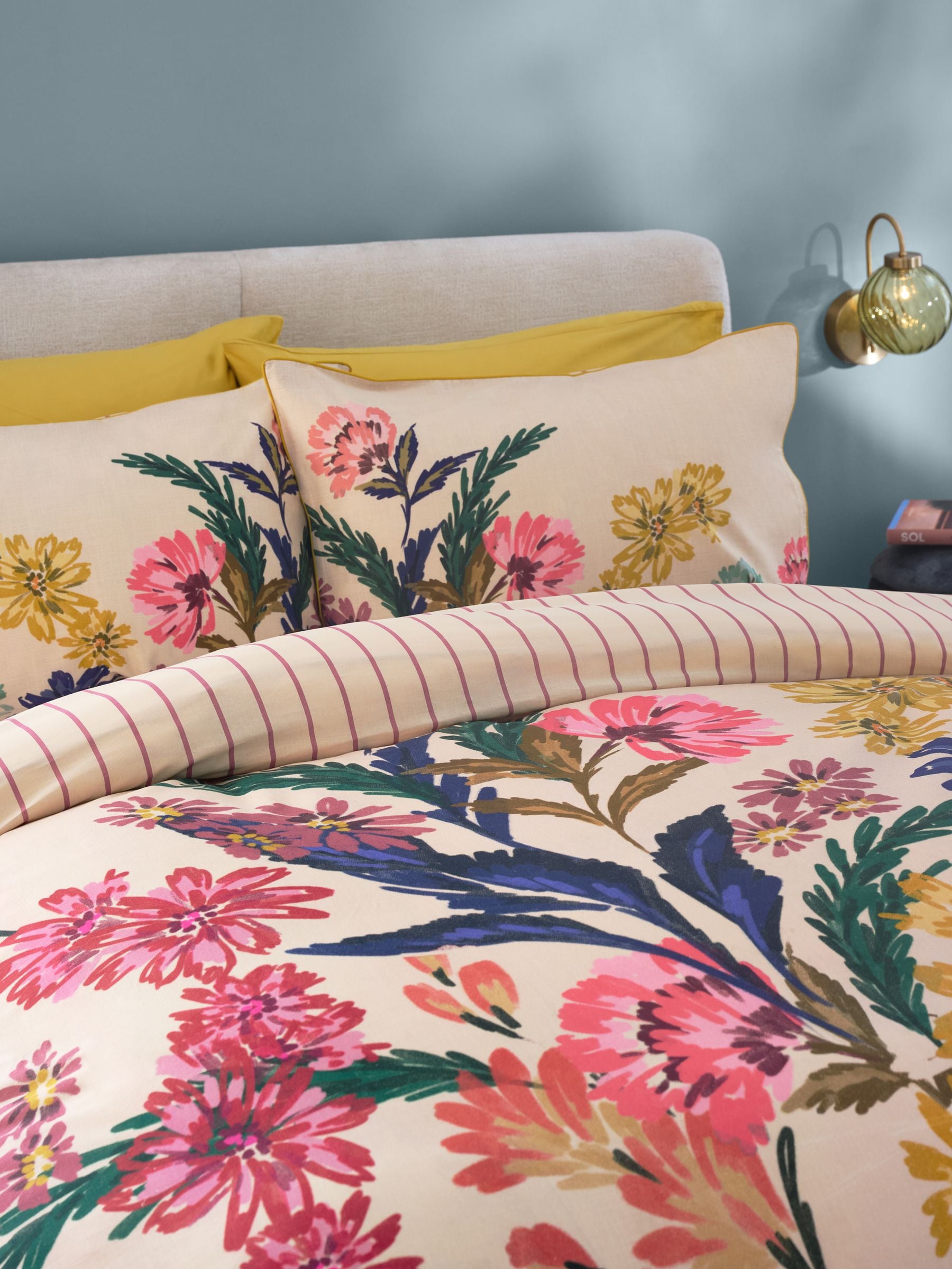 Multi autumn floral print reversible duvet cover and pillowcase set, imported from the UK