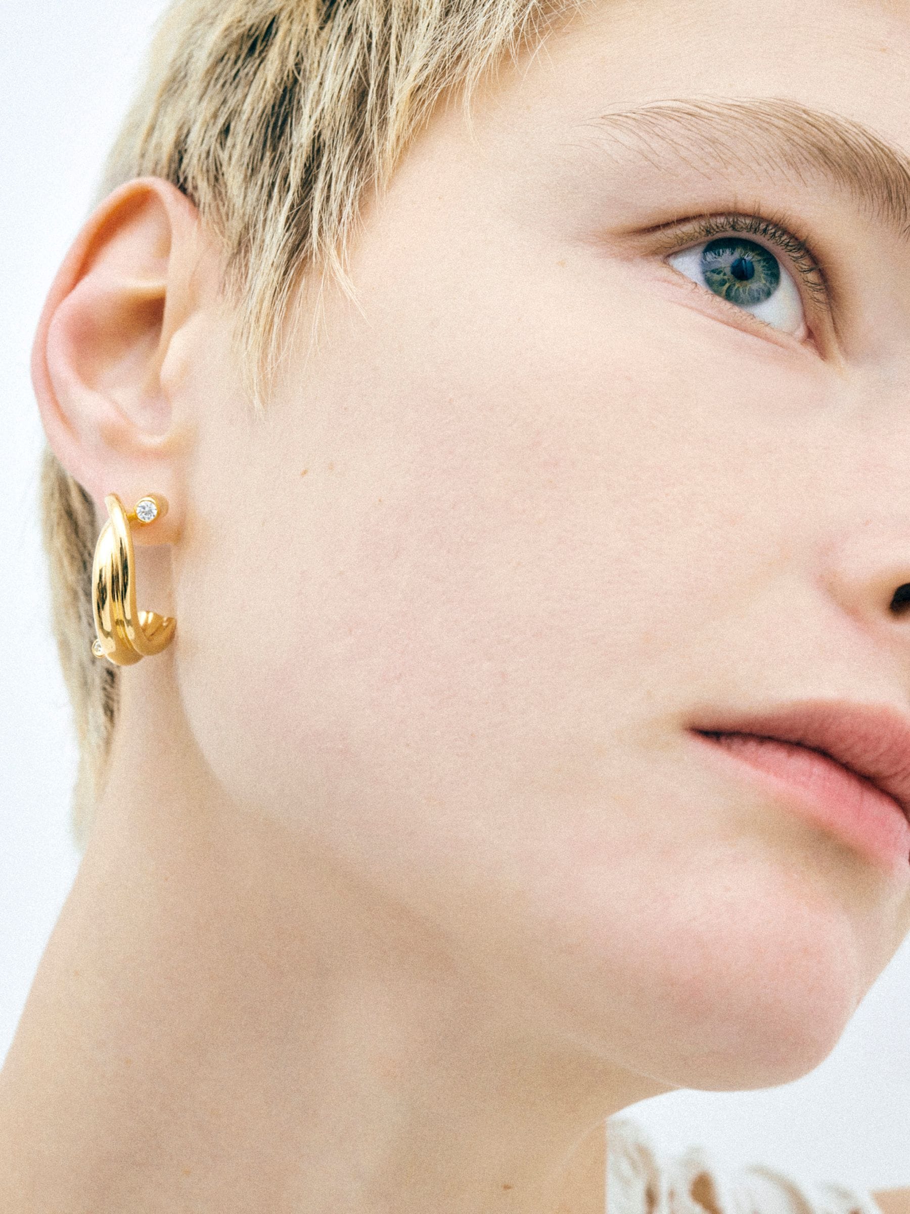 CompletedWorks gold tone earrings 18ct plated with zirconia (British brand)