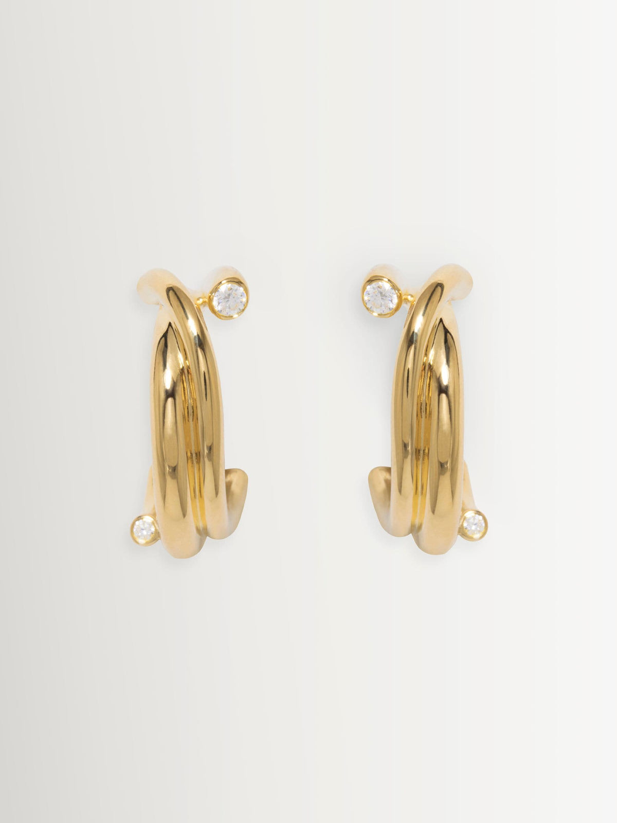 CompletedWorks gold tone earrings 18ct plated with zirconia (British brand)
