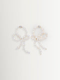 CompletedWorks loop-the-loop pearl earrings, UK version