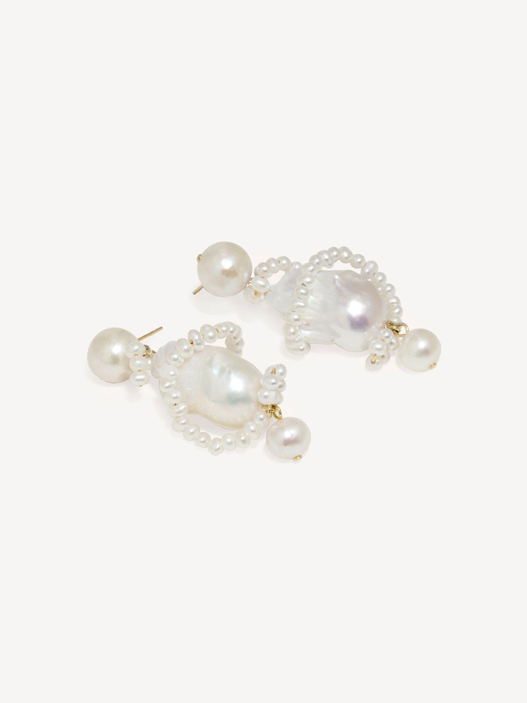 CompletedWorks gold pearl earrings 50mm, imported from the UK