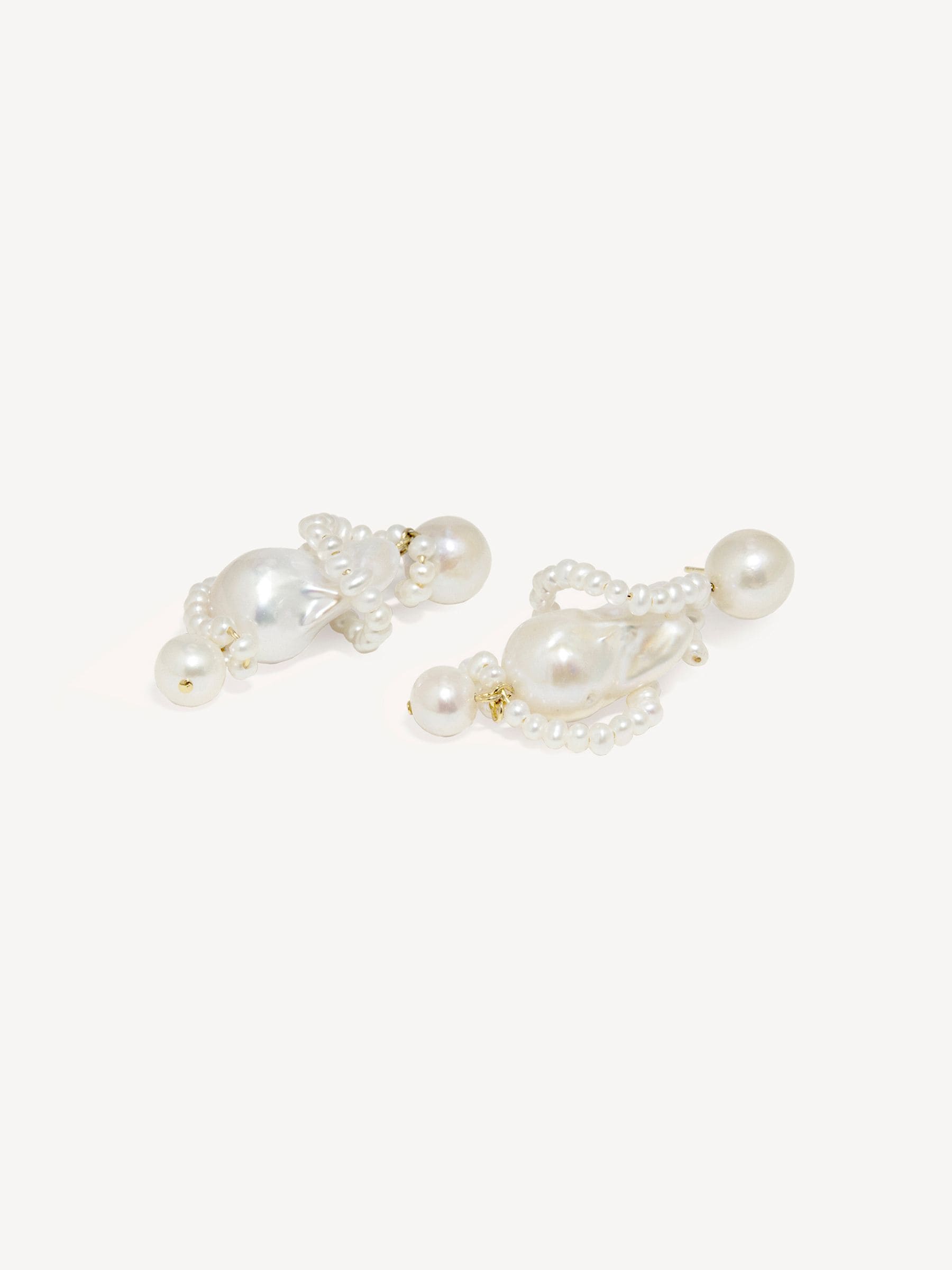 CompletedWorks gold pearl earrings 50mm, imported from the UK