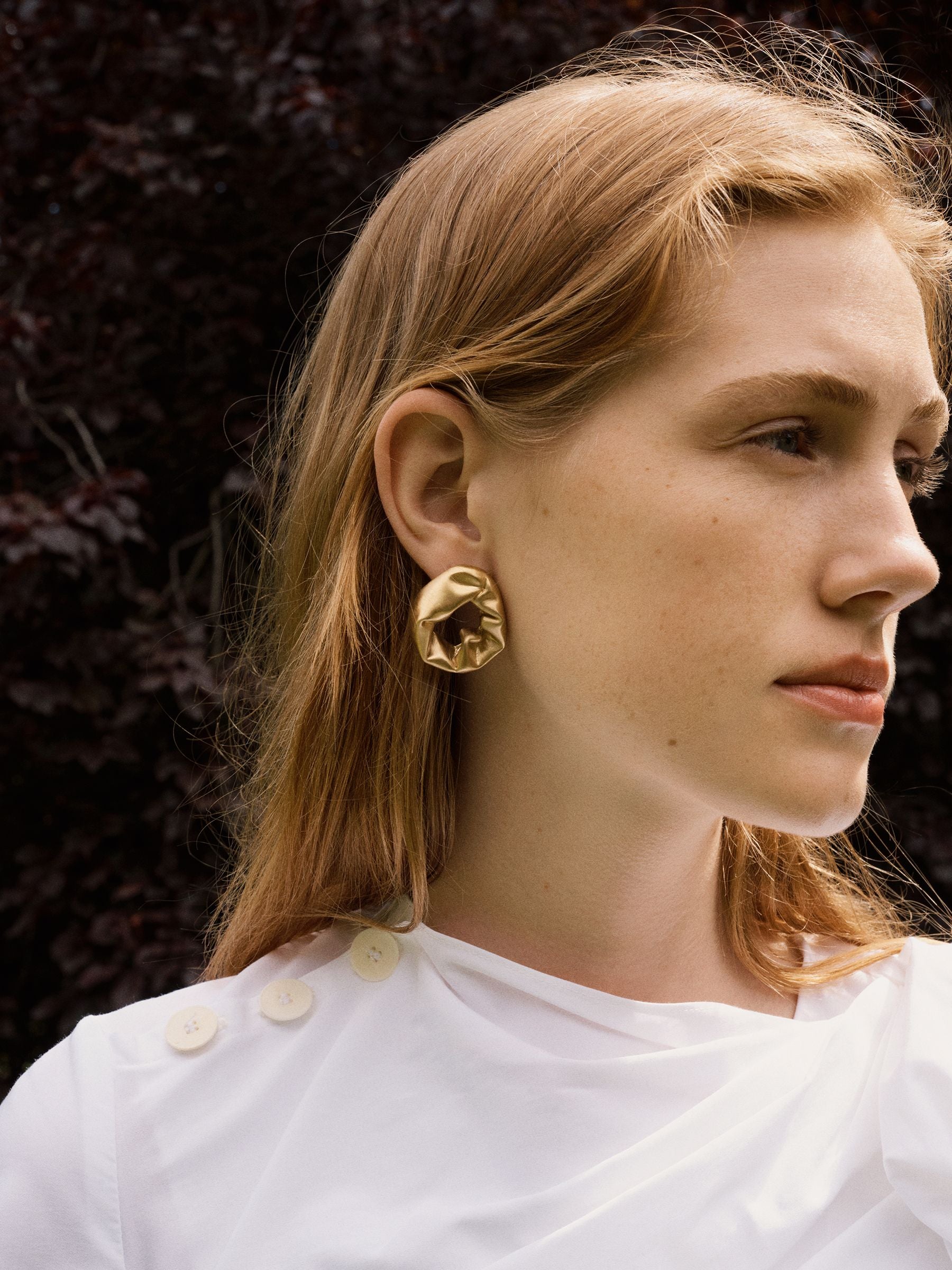 CompletedWorks gold tone scrunch earrings, imported from the UK