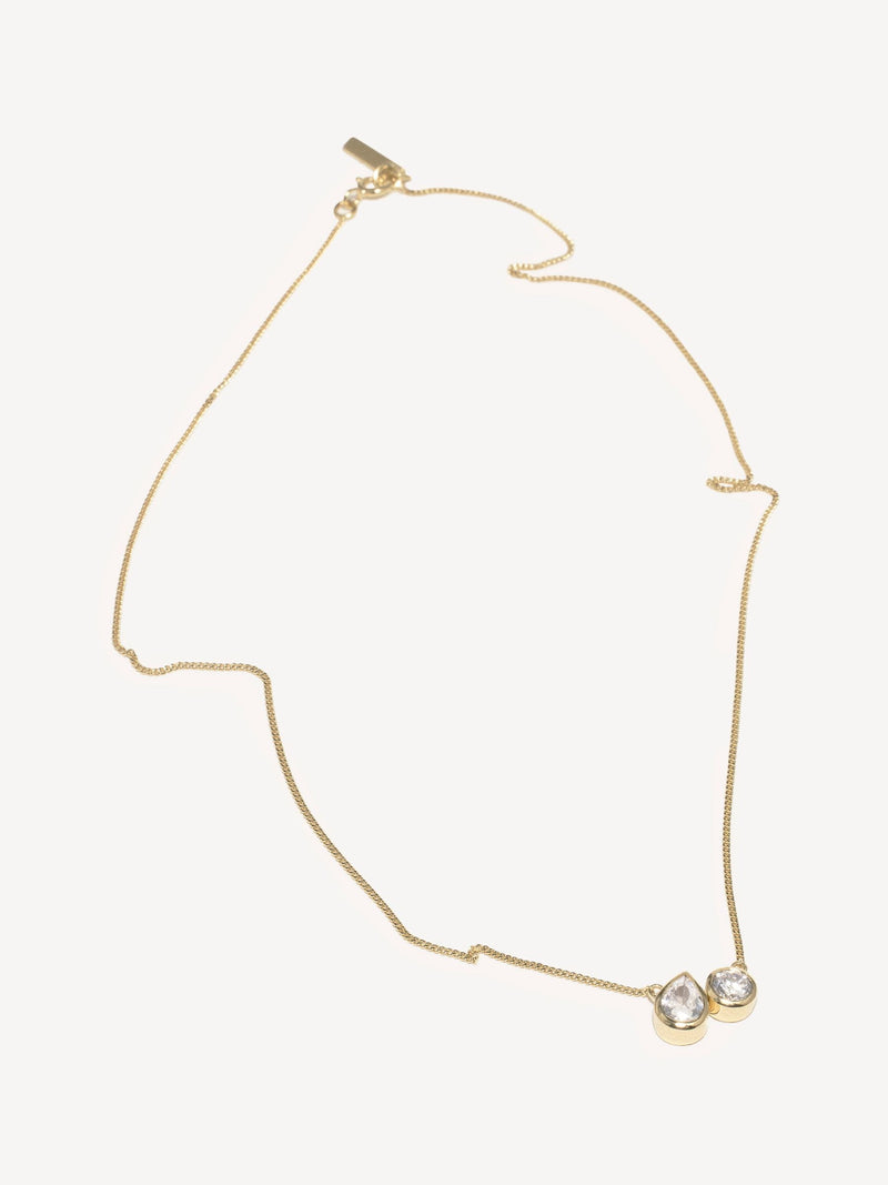 CompletedWorks gold tone peas in a pod necklace, imported from the UK