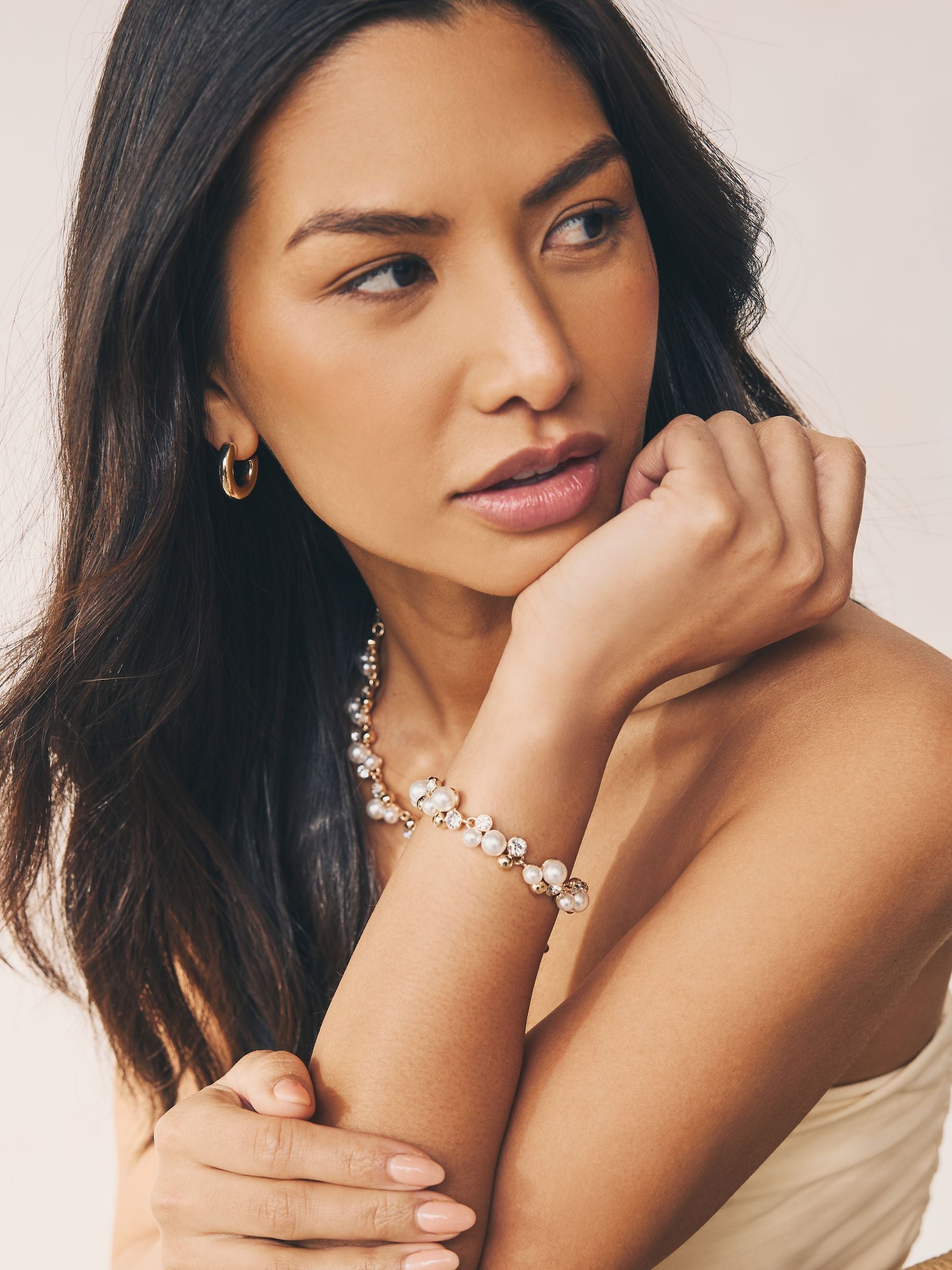 Gold tone sparkle pearl effect pully bracelet, UK version