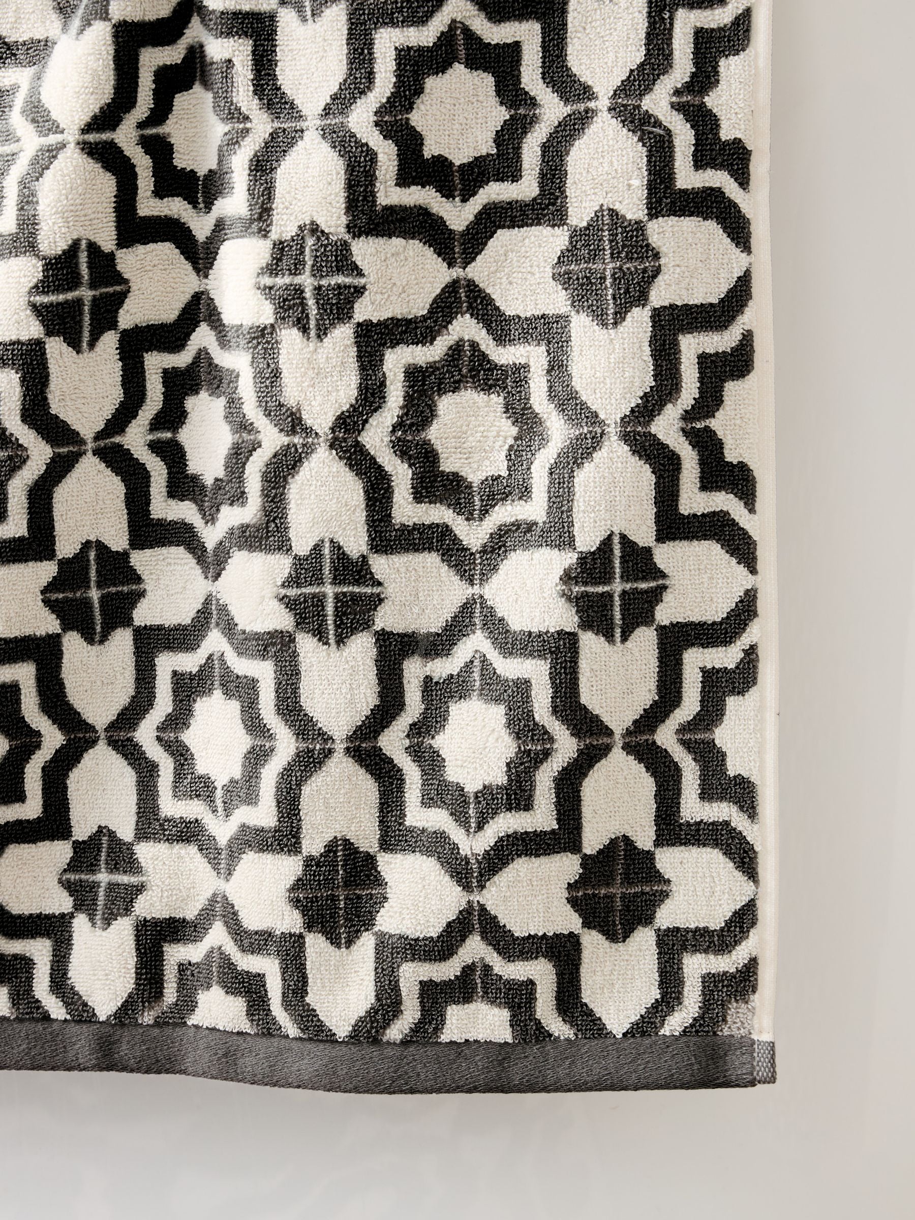 Geometric black white cotton towels from a British brand
