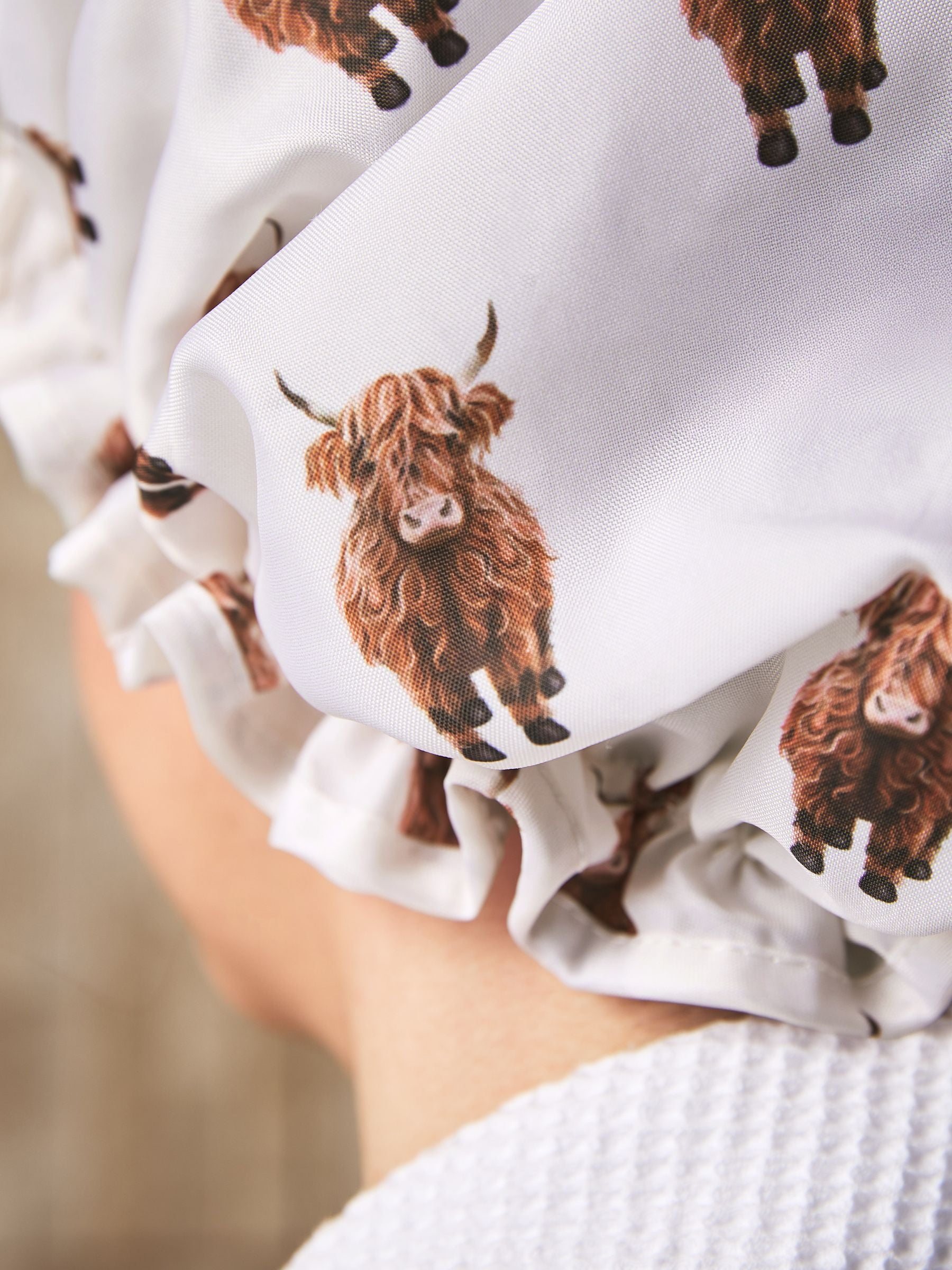 Shower cap with Hamish the Highland cow design, imported from the UK