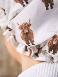 Shower cap with Hamish the Highland cow design, imported from the UK