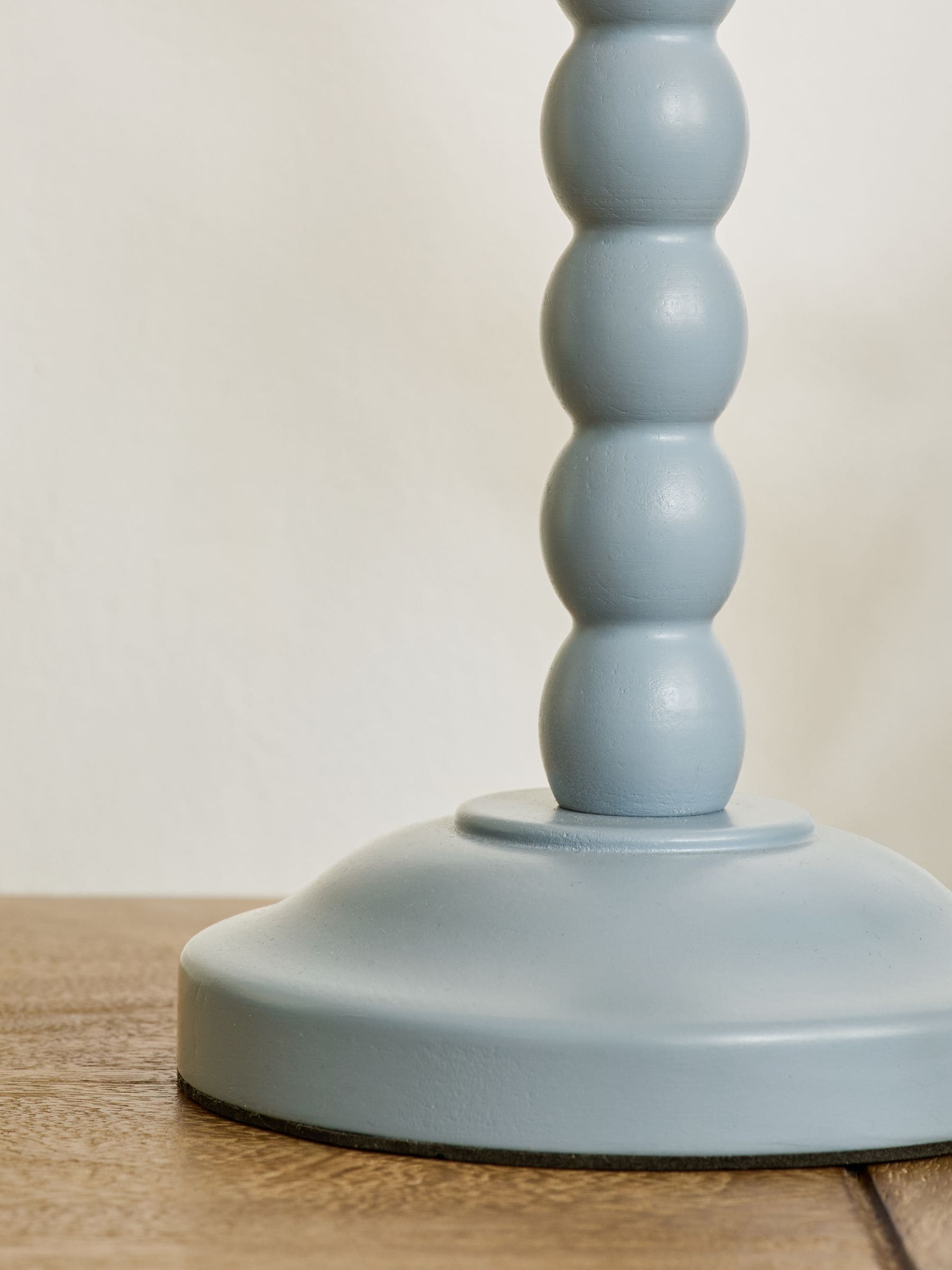 Blue Stripe Millie table lamp with beaded wood stem, imported from the UK