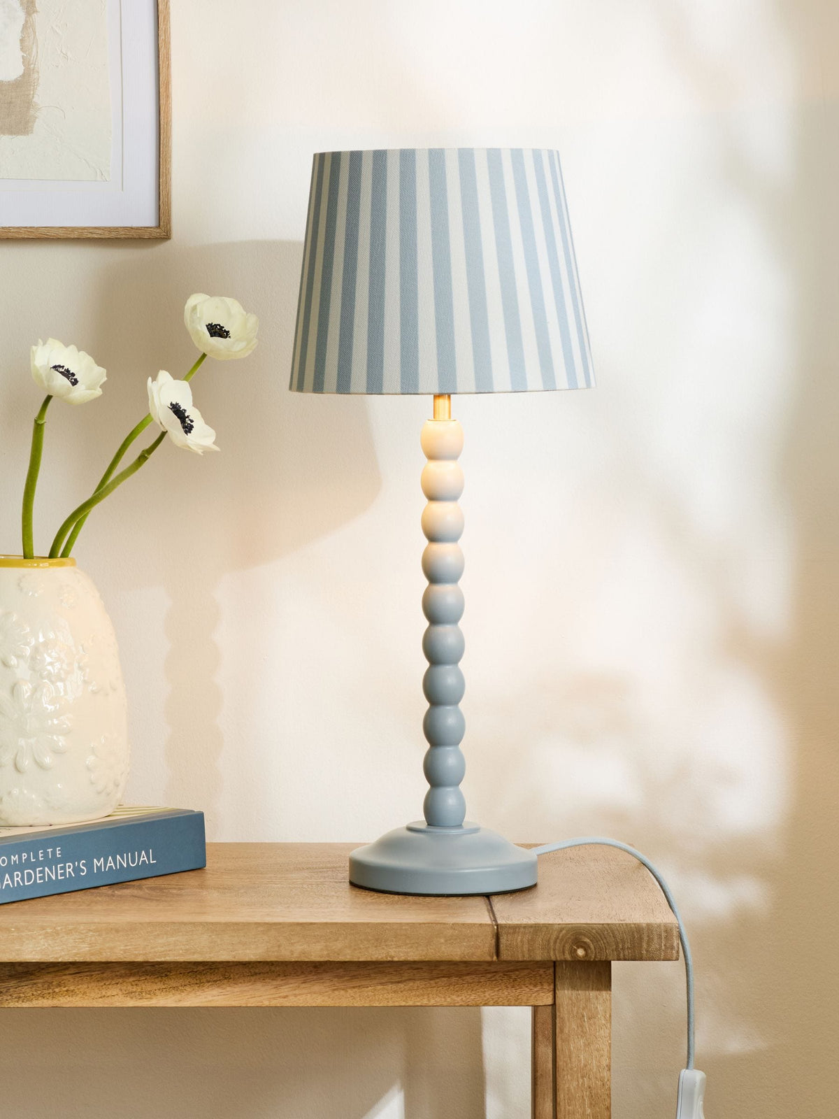 Blue Stripe Millie table lamp with beaded wood stem, imported from the UK