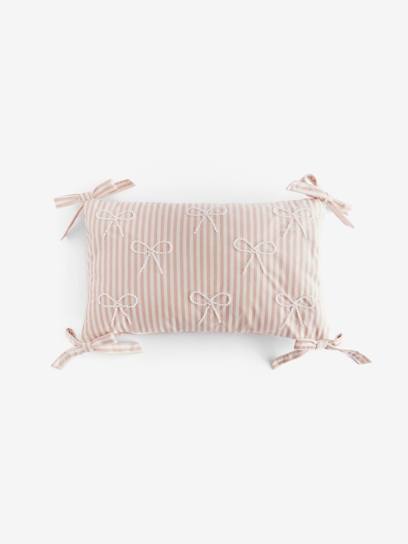Pink velvet cushion with pearl bow detailing 30x50cm (British brand)