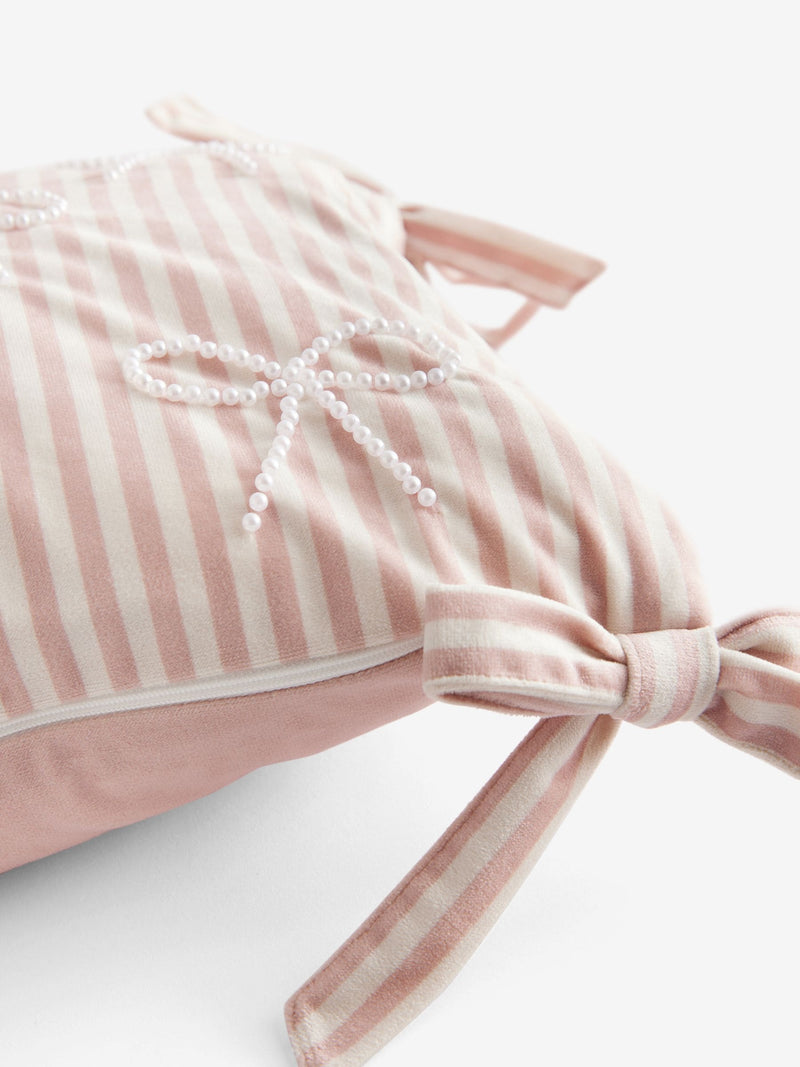 Pink velvet cushion with pearl bow detailing 30x50cm (British brand)