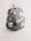 Black floral backpack with daisy design and adjustable straps, UK version