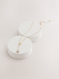 Gold tone heart thread through lariat necklace (British brand)