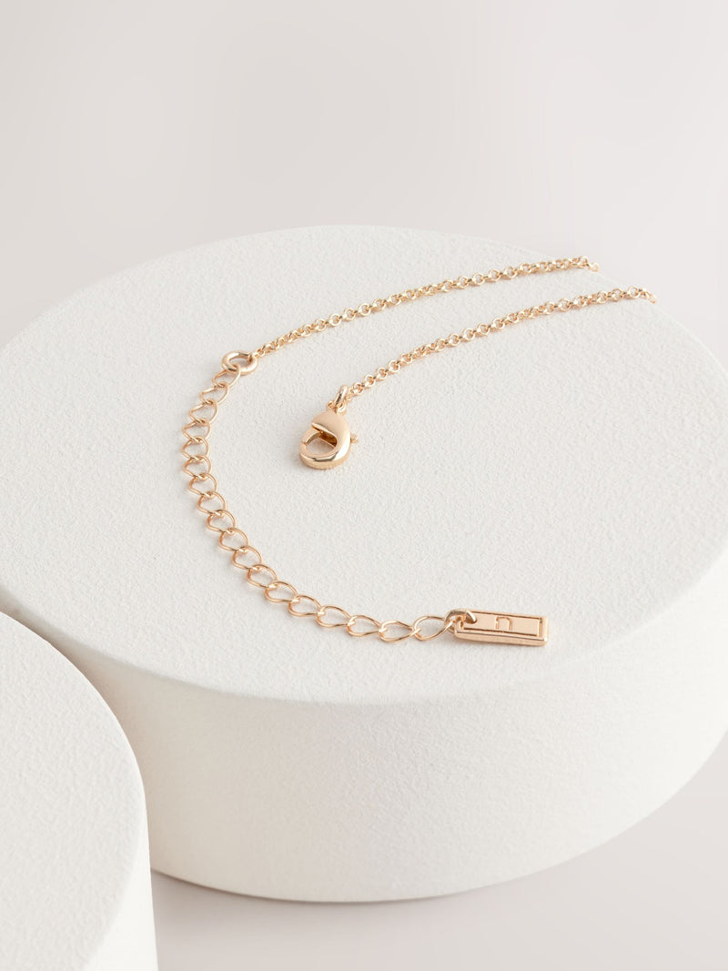 Gold tone heart thread through lariat necklace (British brand)