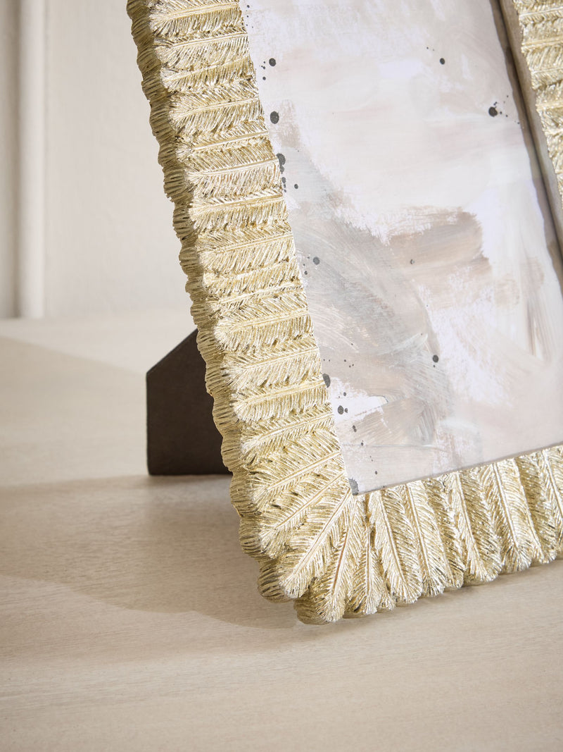 Silver feather photo frame suitable for wall or free-standing display (British brand)