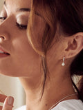 Orelia London opal Swarovski drop huggie hoop earrings, imported from the UK
