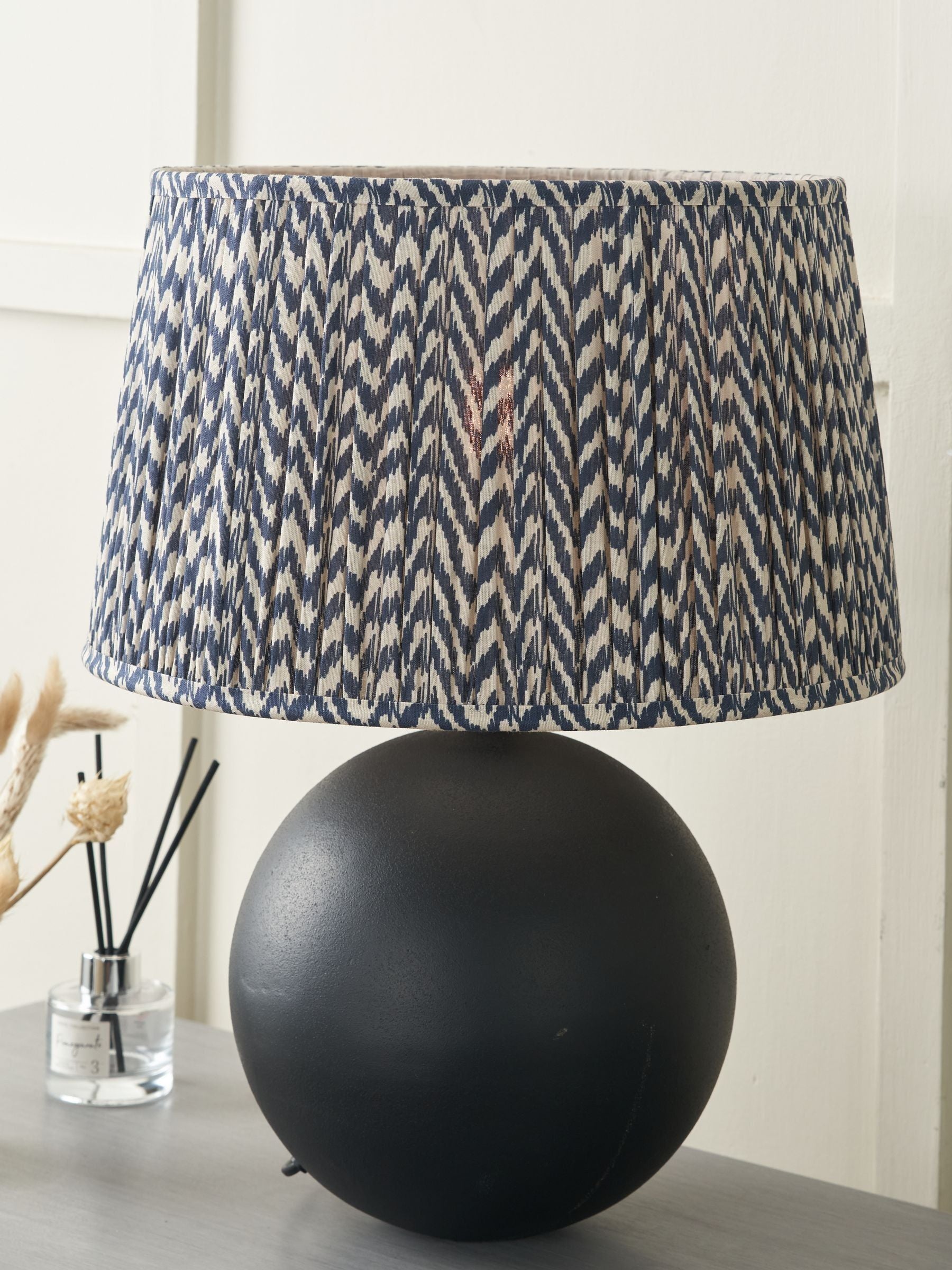 Pacific Lifestyle black geometric mushroom pleat shade, imported from the UK