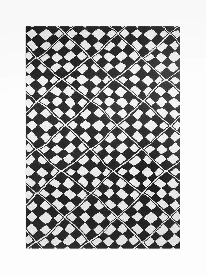 Rockett St George black checkerboard diamond tufted rug (British brand)